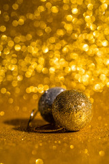Christmas decoration on golden bokeh background. Macro photo