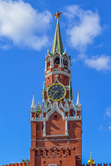 Spasskaya tower of Moscow Kremlin with striking clock on Red Square, symbol of Moscow and famous architectural landmark