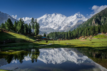 View of mighty Nanga Parbat Mountain (8,126 meters) Pakistan, also known as the Killer Mountain is one among the 14 eight-thousanders. - obrazy, fototapety, plakaty