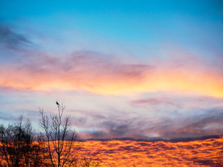 Dramatic orange color skyline with mystical clouds