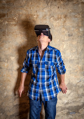 Young Man in VR Glasses