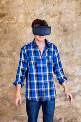 Young Man in VR Glasses