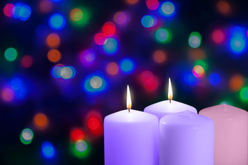 Christmas violet and pink candles. Second Sunday of the Advent. Bethlehem, Peace Candle. Xmas...