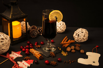 Mulled wine, hot drink on a black background