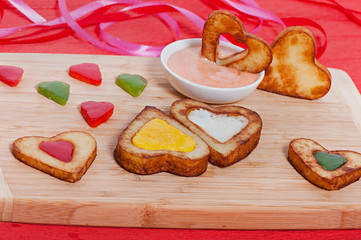 French fries and vegetables cut into the heart. Valentine's Day