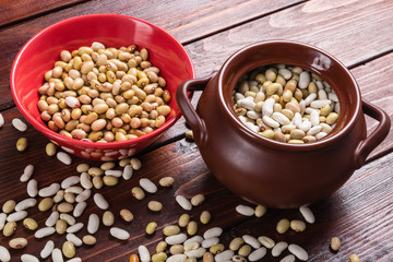 Dried beans on a wooden table