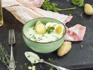green sauce with eggs, potatoes and apple wine