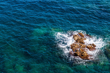 The Mediterranean Sea in Spain. Soft Wave Of Blue ocean background. Summer outdoor nature harmony. Summer holiday serenity.