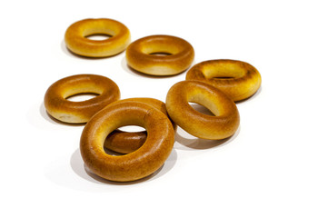 A few bagels on a white background.