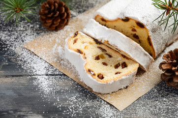 Christmas Stollen. Traditional German, European Festive Dessert. Holiday Concept Decorated with Fir...
