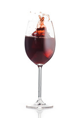 Red wine glass with splash