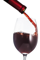 Red wine poured into a glass