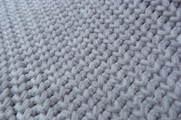 knitted scarf of woolen threads close-up knitted cloth clothing design textiles natural materials close-up wallpaper background texture