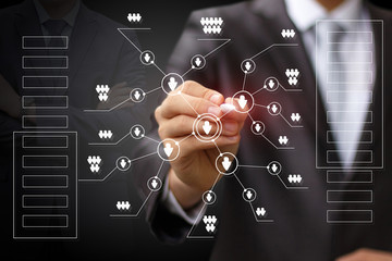 Businessman draws a network .