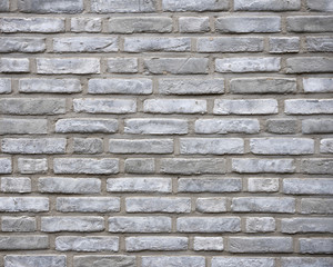 horizontal part of wall consisting of grey silver bricks