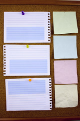 Lined note paper with sticky tape. Paper piece on white notice board, office and business stationary, blank copy space for text