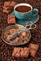 Composition with  coffee cup and tasty cookies with brown sugar