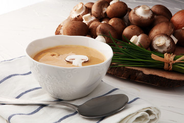 Mushroom cream soup with herbs and champignons