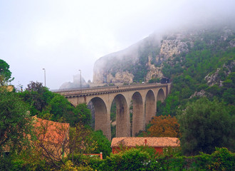 Obraz premium Stone Arch bridge (viaduct) near Eze village, French Riviera, Cote d'Azur, France.