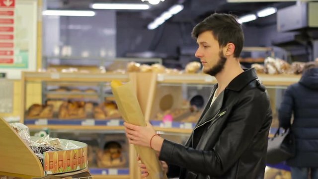 Bakery. buyer buying bread in the supermarket