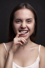 Fototapeta premium Portrait of funny emotional girl with freckles