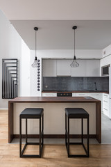 Kitchen with table and stools