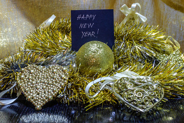 New Year's golden decoration on a black background