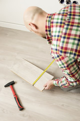 Preparing of man for laying laminate at home