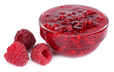 raspberry jam with raspberry berries isolated on white background