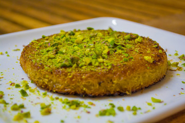 turkish dessert kunefe with pistachio clipping path inside