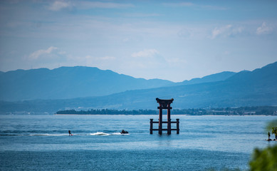 Holi shrine in the blue clear water of the pacific ocean in japan