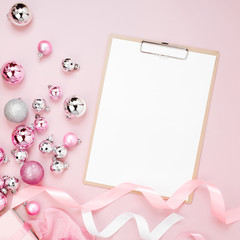 Clipboard mockup  Christmas decor. Arrangement in pastel pink colors.