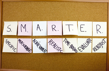 inscription Phrase SMARTER in black ext on a sticky note pinned to a cork notice board specific,...