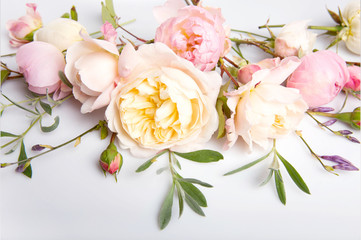 Festive flower English rose composition on the white background. Overhead top view, flat lay. Copy space. Birthday, Mother's, Valentines, Women's, Wedding Day concept.