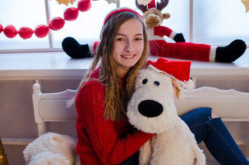 Teenage girl with christmas presents