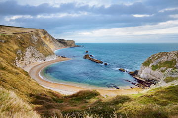 Man O'War Cove on the Dorset coast in southern England, between the headlands of Durdle Door to the...