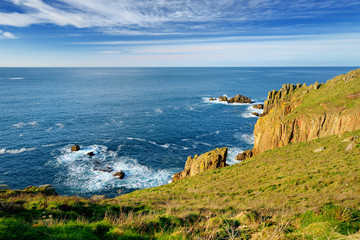 Rough and rocky shore near Land's End, the most westerly point of England, Cornwall