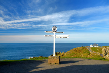Distance signpost at Land's End, Penwith Peninsula, Cornwall, most westerly point of England.