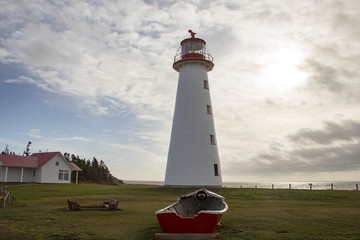 Point Prim Lighthouse, PEI and old wooden rowboat