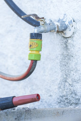 tank with hose to irrigate