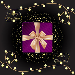 Happy New Year and Merry Christmas velvet gift box with golden bow, lamp bulbs, bubbles.