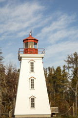 Cape Bear Lighthouse, PEI against blue skies