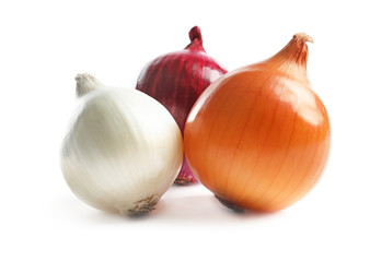 Variety of different onions on white background