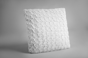 Soft pillow on light background