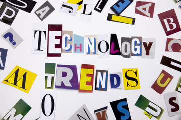 A word writing text showing concept of TECHNOLOGY TRENDS made of different magazine newspaper letter for Business case on the white background with copy space