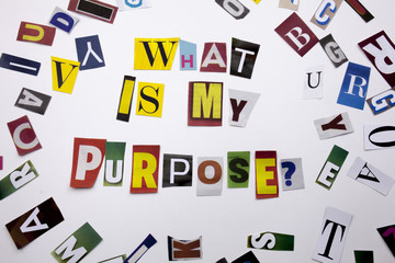 A word writing text showing concept of WHAT IS MY PURPOSE made of different magazine newspaper letter for Business case on the white background with copy space