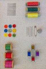 Colored thread and buttons.