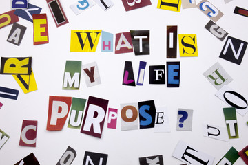 A word writing text showing concept of WHAT IS MY PURPOSE made of different magazine newspaper letter for Business case on the white background with copy space