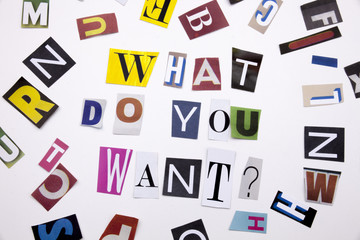 A word writing text showing concept of WHAT DO YOU WANT QUESTION made of different magazine newspaper letter for Business case on the white background with copy space