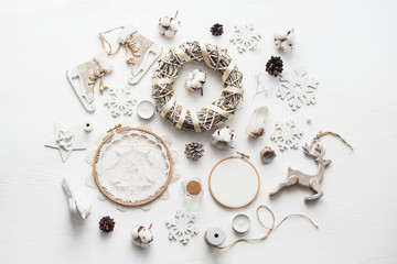 Flat lay top view Christmas photo with an embroidery hoop and cute decoration.